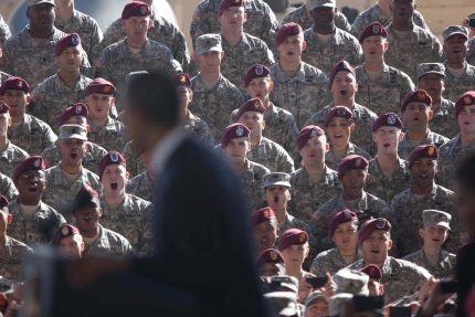 President Barack Obama flanked by soldiers at Fort Bragg, N.C.